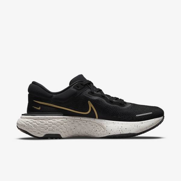 Men's Nike ZoomX Invincible Run Flyknit Road Running Shoes Black / Metal Gold | NK523LWO