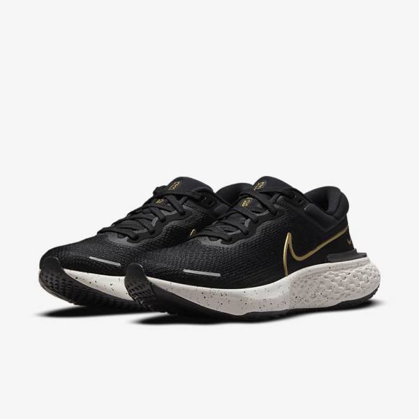 Men's Nike ZoomX Invincible Run Flyknit Road Running Shoes Black / Metal Gold | NK523LWO