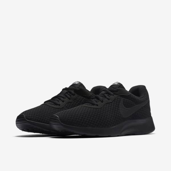 Women's Nike Tanjun Sneakers Black / White | NK183MQL