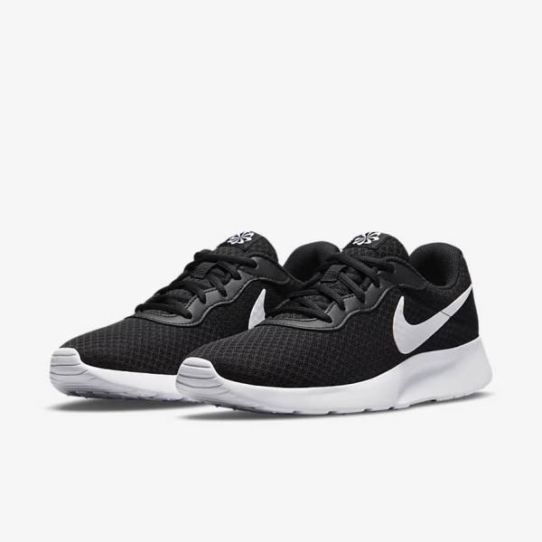 Women's Nike Tanjun Sneakers Black / White | NK246IYS