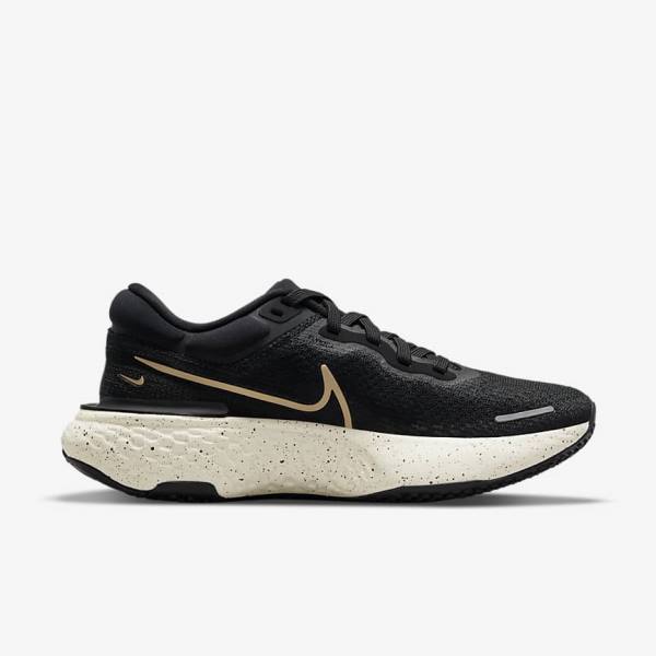 Women's Nike ZoomX Invincible Run Flyknit Road Running Shoes Black / Metal Gold | NK751DNQ